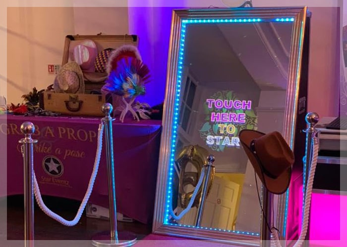 Guests using the Star Eventz Photo Booth at a Wedding in Loughborough